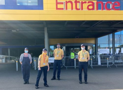 4 people standing in front of the IKEA Exeter store entrance